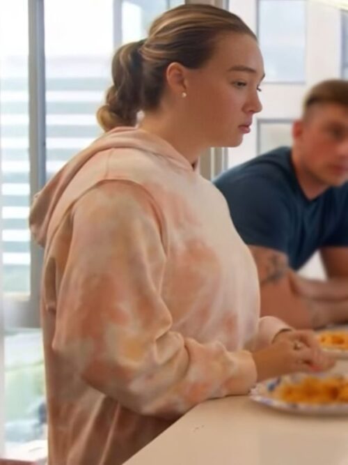 Baylen Dupree styles a pink and white tie-dye hoodie featuring her chic look in the TV series Baylen Out Loud.