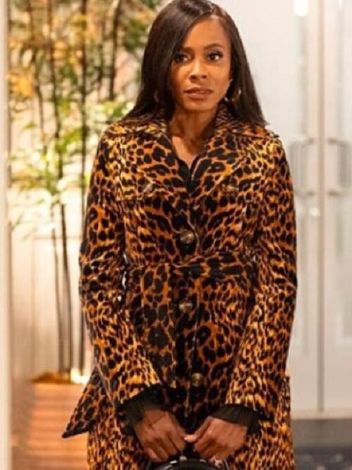 A bold leopard print coat styled by Marquita Goings as Hayley Lawson in Beyond The Gates 2025, perfect for fall fashion.