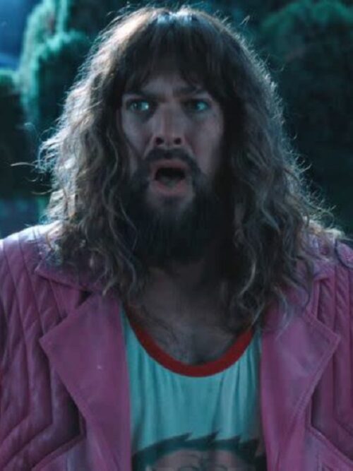 Jason Momoa wearing the Garrett Garrison Pink Fringed Jacket from A Minecraft Movie, showcasing a bold and stylish look.