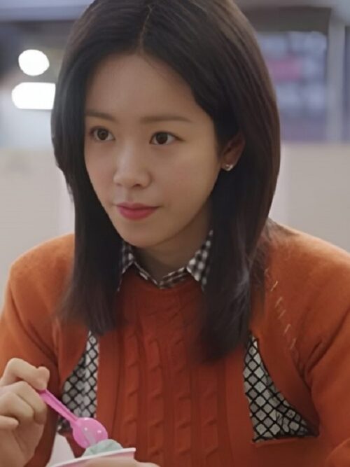 Han Ji-min enjoys a bowl of soup with a spoon, dressed in an Orange Hybrid Shirt from the TV Series Love Scout 2025.