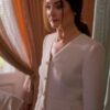 A refined and polished look, The Royal We Mallory Jansen White Tweed Blazer showcases a structured silhouette, pearl-like buttons, and luxurious fabric, perfect for formal occasions.