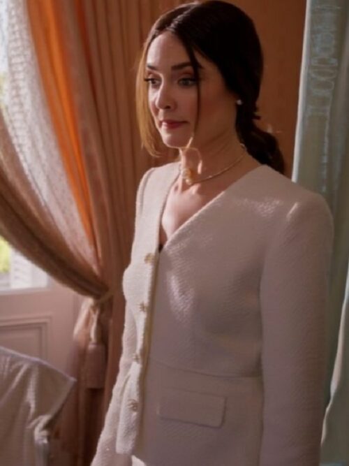 A refined and polished look, The Royal We Mallory Jansen White Tweed Blazer showcases a structured silhouette, pearl-like buttons, and luxurious fabric, perfect for formal occasions.