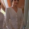 Mallory Jansen elegantly dons The Royal We Mallory Jansen White Tweed Blazer, featuring a sophisticated button-up design and a tailored fit, exuding timeless class and grace.