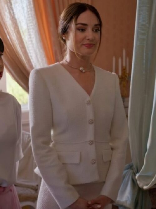 Mallory Jansen elegantly dons The Royal We Mallory Jansen White Tweed Blazer, featuring a sophisticated button-up design and a tailored fit, exuding timeless class and grace.